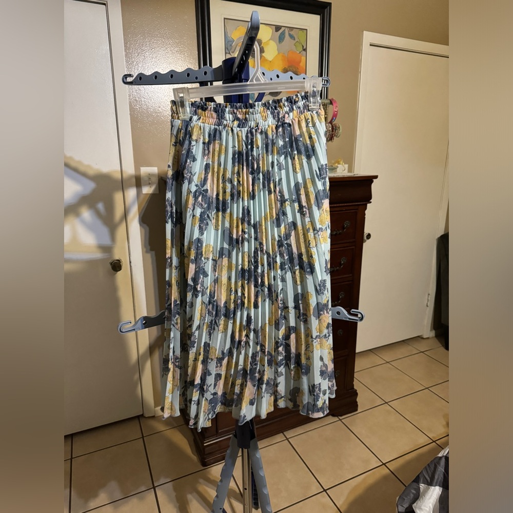 Brand : Disney . Comfortable skirt, looks brand new.